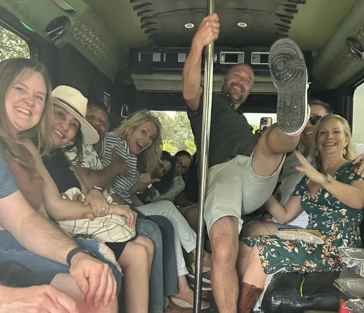 Group enjoying a Hill Country wine tour on an Austin Party Bus